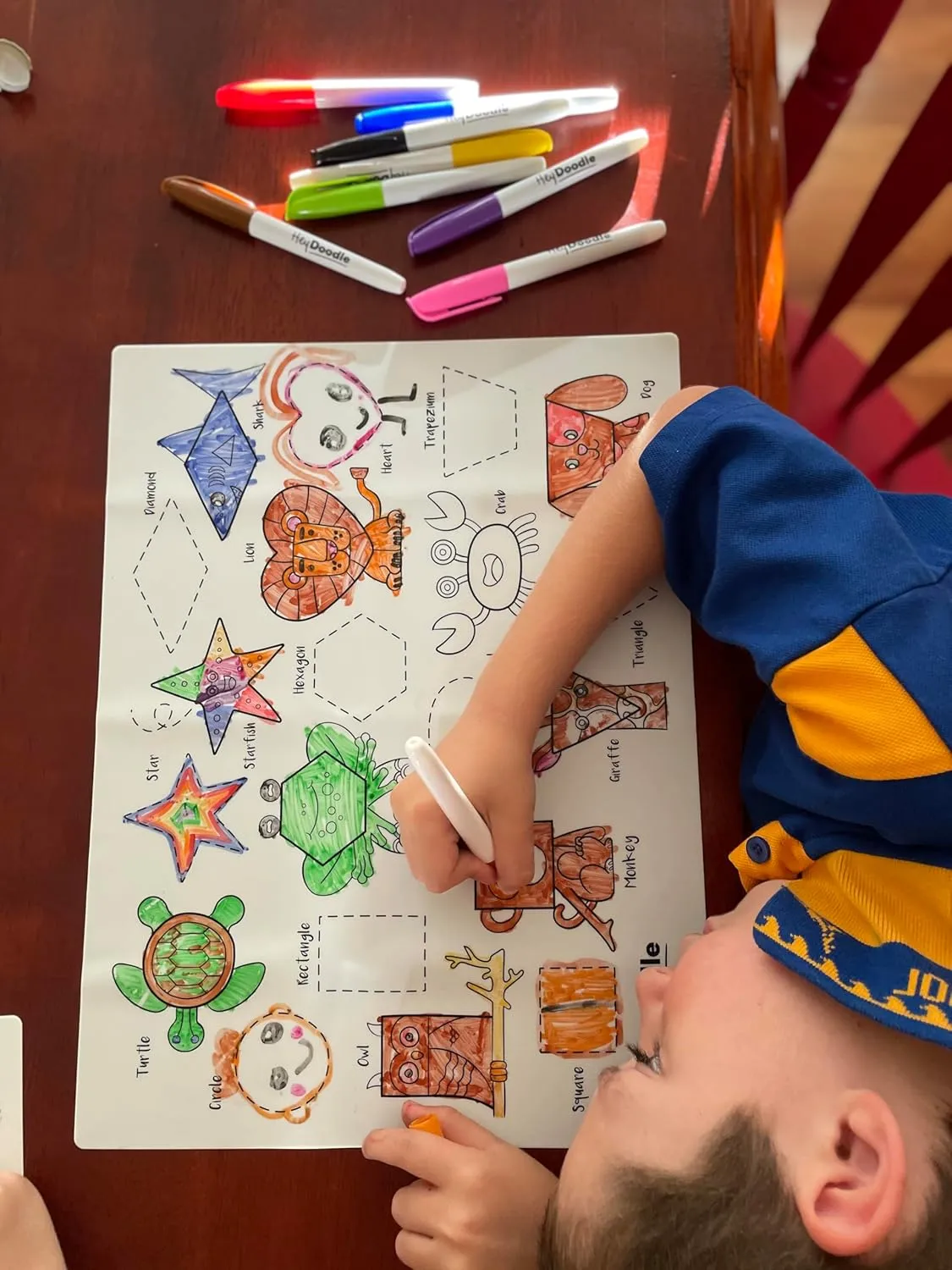 Hey Doodle Shape Shifters Classic Doodle Mat – Reusable Silicone Drawing Mat for Toddlers and Kids – Educational Shape & Animal Activity Pad with 9 Markers – Mess-Free Travel Toy – Ages 3-7