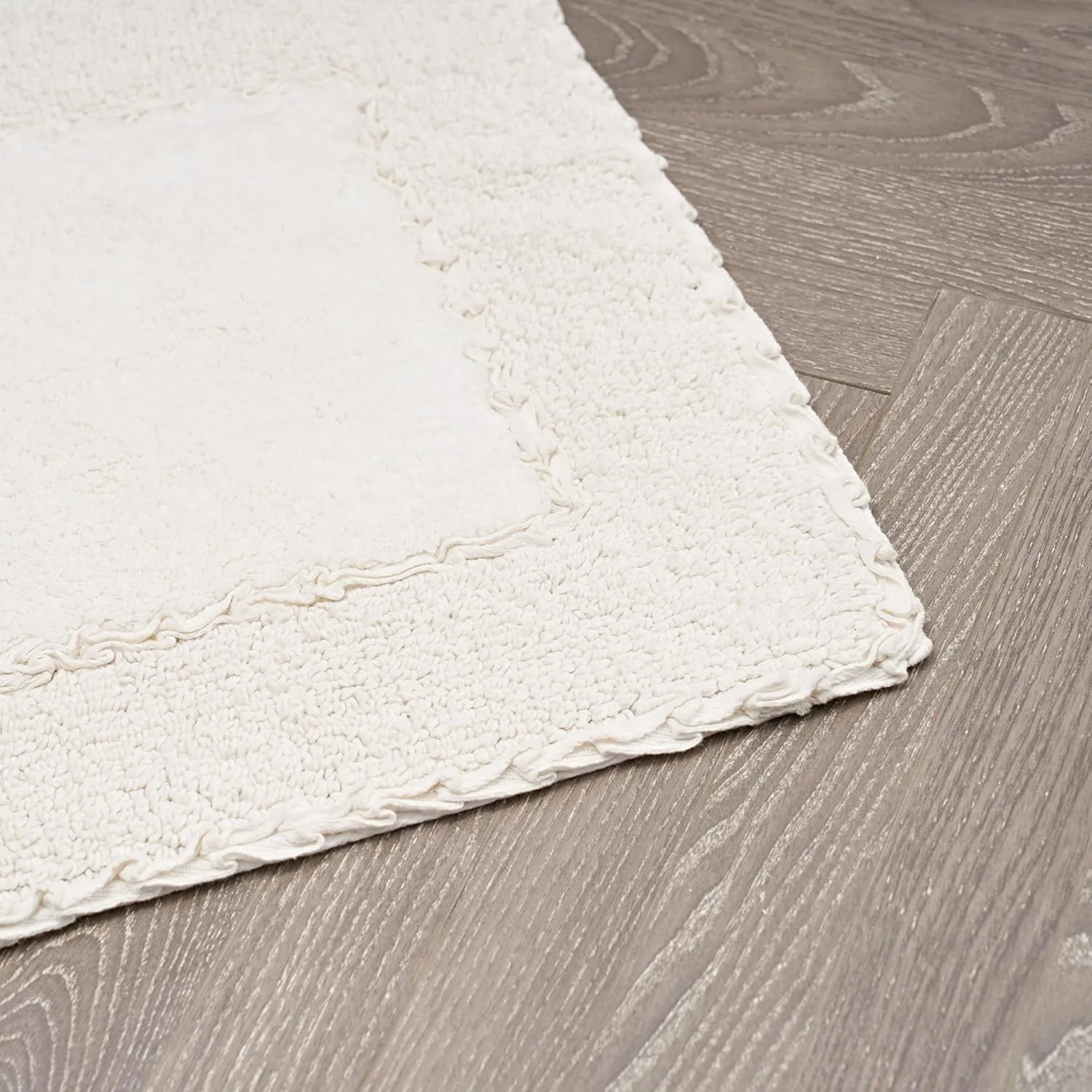 Laura Ashley Ruffle Cotton 17" x 24" Bath Rug, Ivory