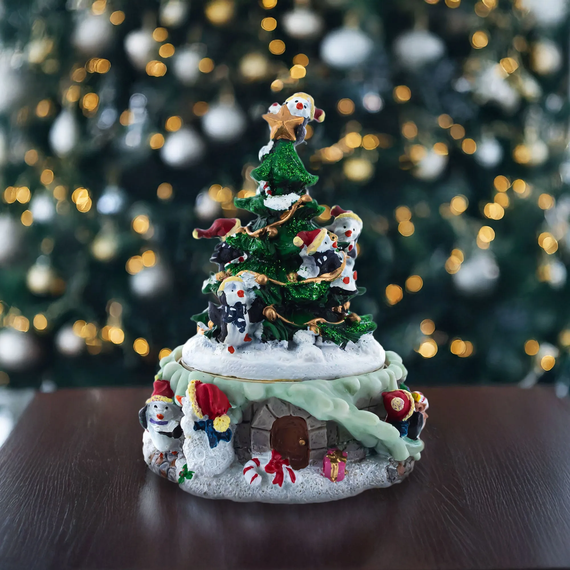 Penguin Festivity: Spinning Christmas Tree Musical Figurine with Decorating Penguins