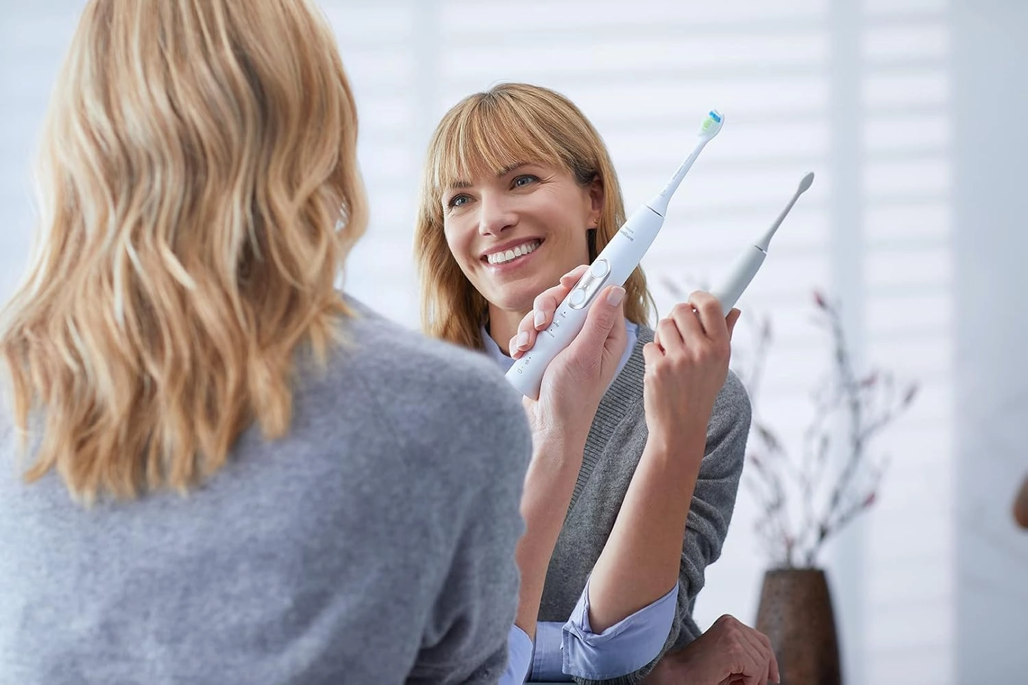 Philips Sonicare ProtectiveClean 6500 Rechargeable Electric Toothbrush, with Pressure Sensor, 3 Cleaning Modes, SmarTimer and QuadPacer, 14-Day Battery Life, Charging Travel Case, Pink, HX6462/06